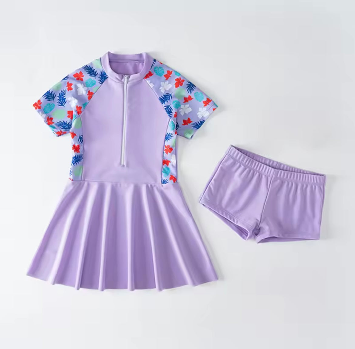Girls purple swimming dress and shorts set.