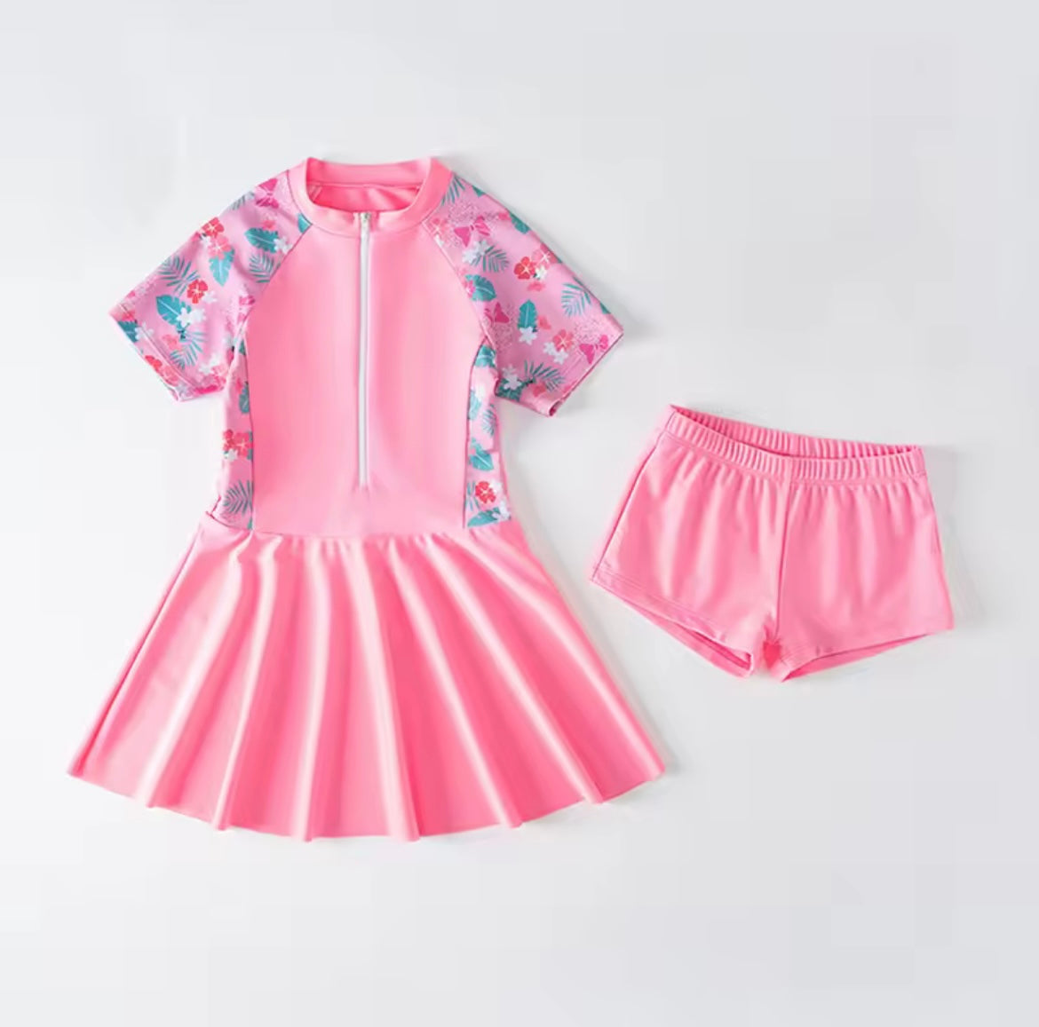 Girls pink swimming dress and shorts set.