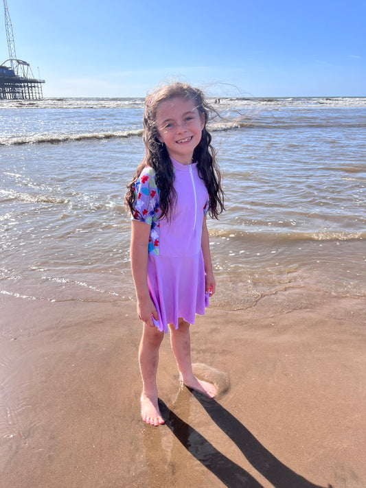Girls purple swimming dress and shorts set.